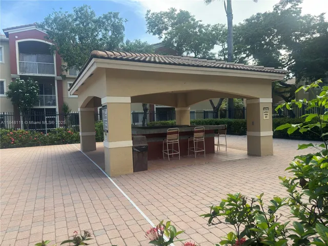 a view of a house with a swimming pool