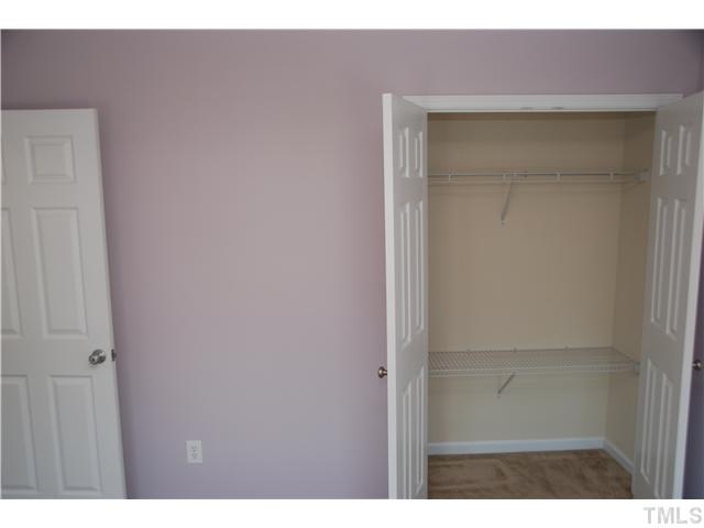 505 Thistlegate Trail Raleigh, NC 27610 - Photo 14 of 21 Deep closet with shelving.