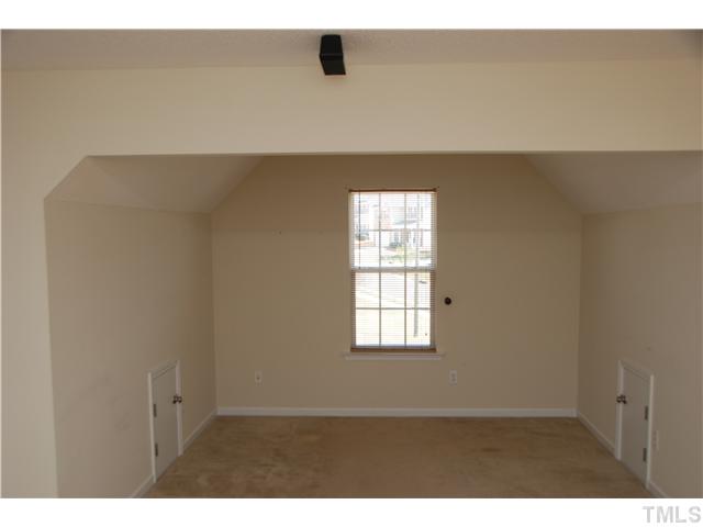505 Thistlegate Trail Raleigh, NC 27610 - Photo 19 of 21 This Bonus room is Huge! Surround sound hookups in place