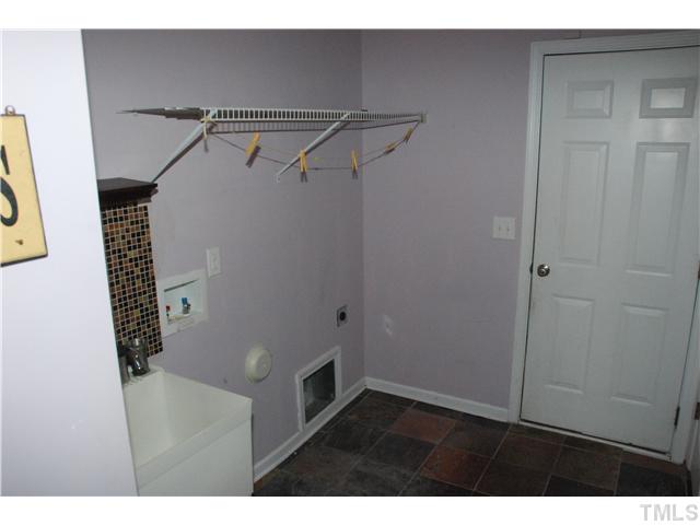 505 Thistlegate Trail Raleigh, NC 27610 - Photo 9 of 21 Laundry room has plenty of space