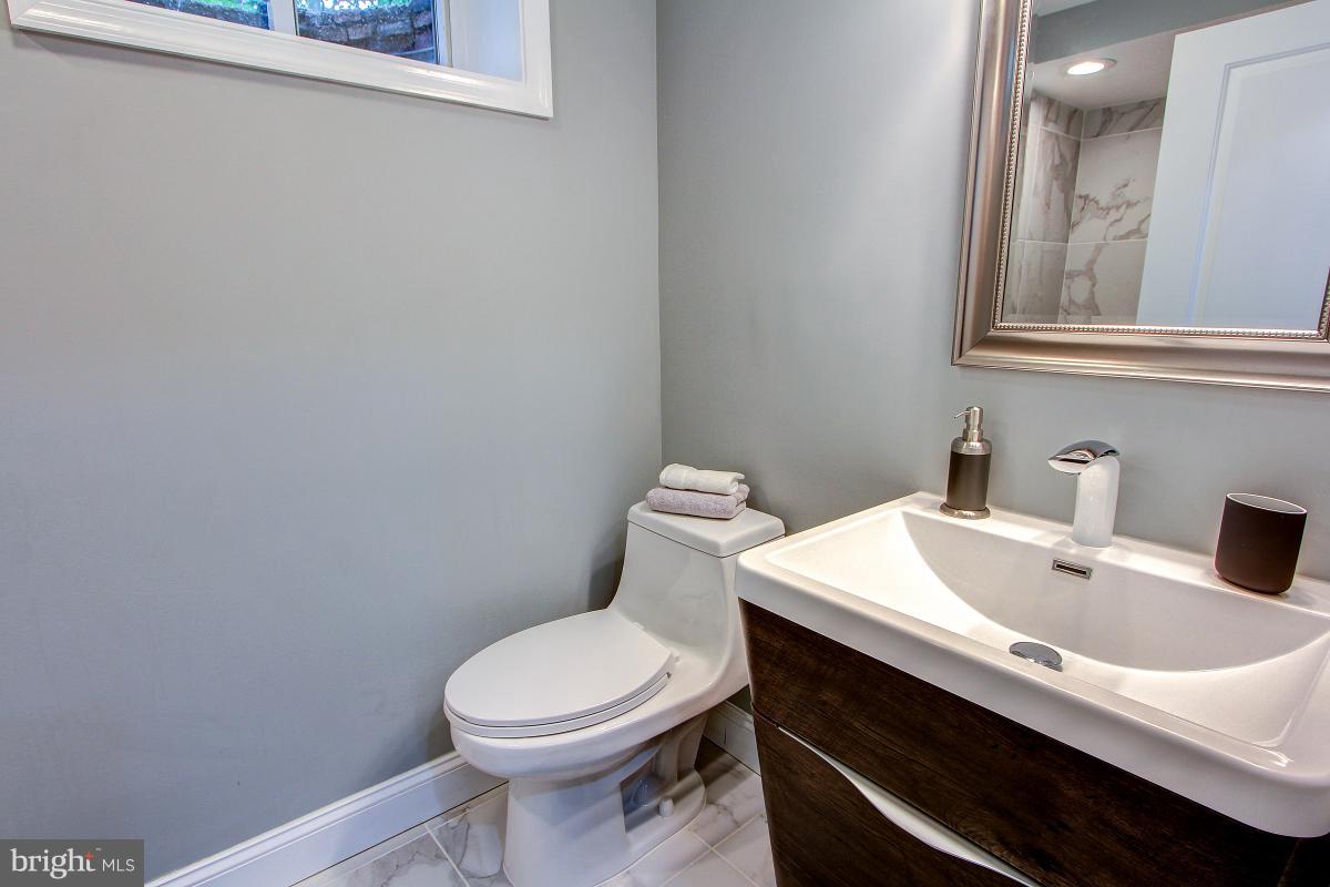 8317 Piney Branch Road Silver Spring, MD 20910 - Photo 26 of 30 HALF BATH IN LOWER LEVEL