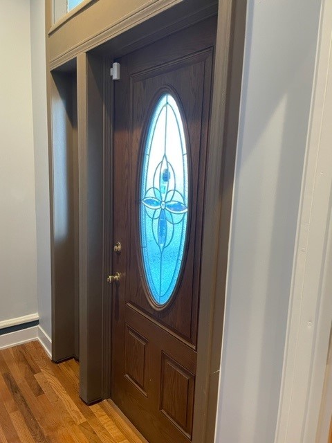 Undisclosed Address Chicago, IL 60644 - Photo 2 of 7 a view of entryway with wooden floor