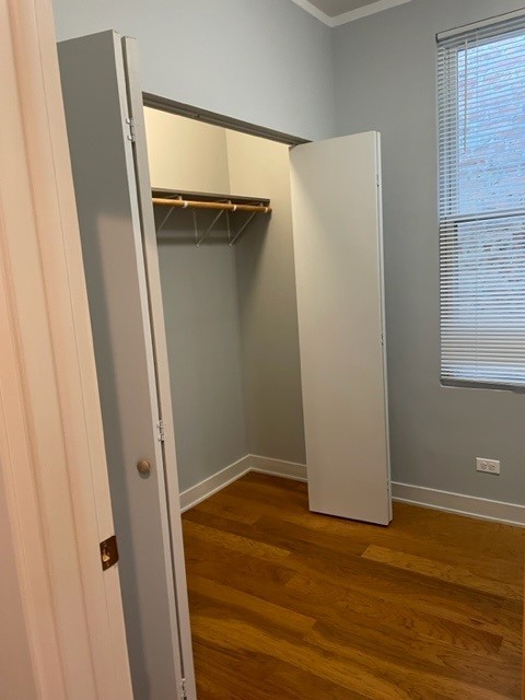 Undisclosed Address Chicago, IL 60644 - Photo 6 of 7 a view of empty room with wooden floor