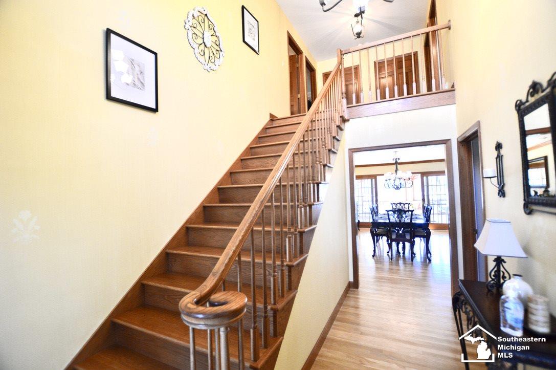 744 East Hurd Road Monroe, MI 48162 - Photo 23 of 68 WOOD HAND CRAFTED STAIRS