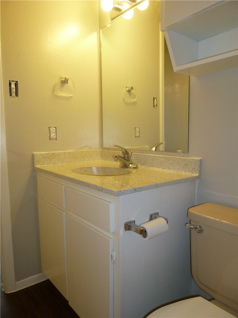 3000 Guadalupe Street, Unit 313 Austin, TX 78705 - Photo 10 of 14 a bathroom with a sink a toilet and shower