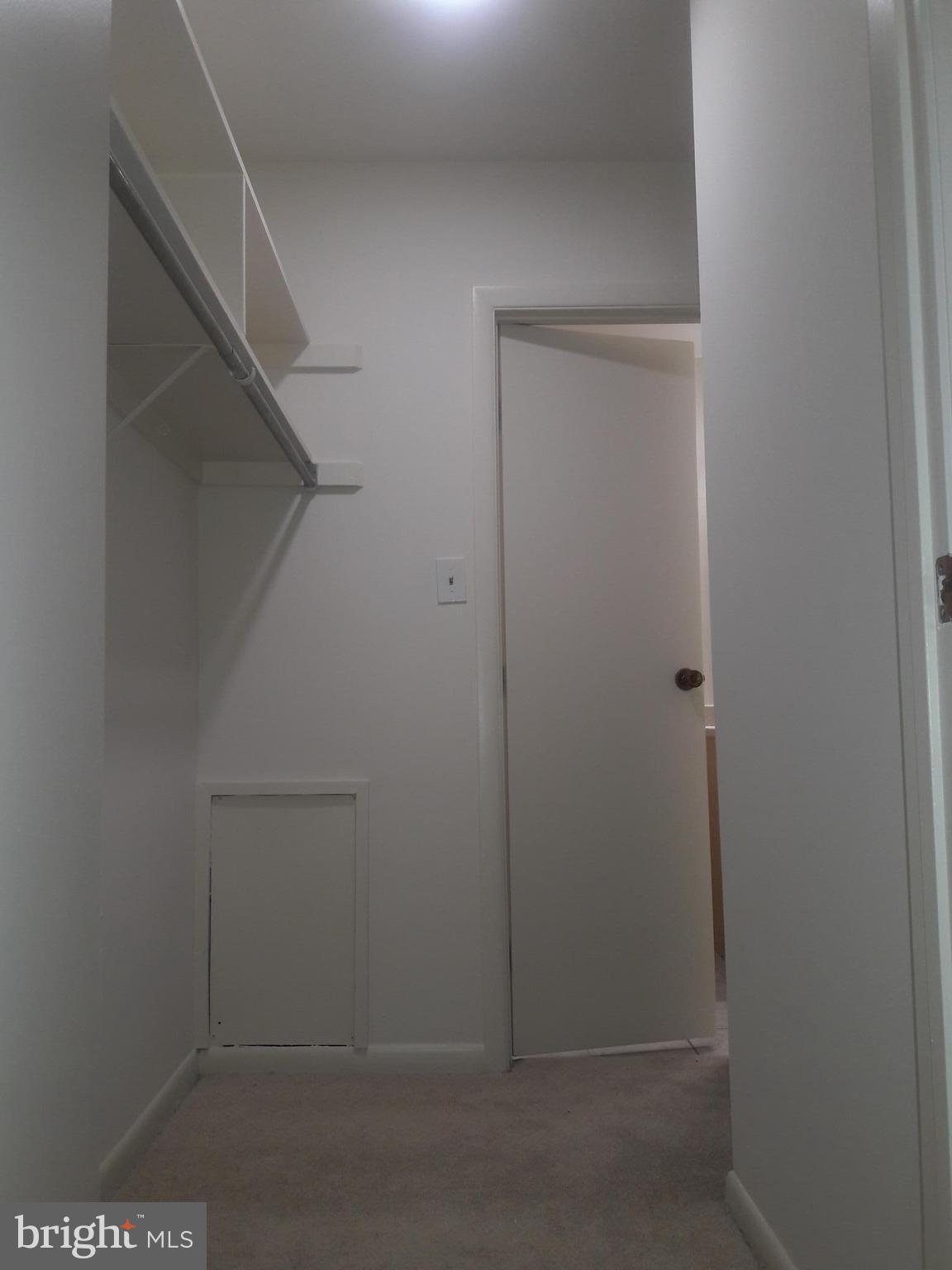 5806 Royal Ridge Drive, Unit E Springfield, VA 22152 - Photo 7 of 14 Master Bedroom closet (walk thru to bathroom)