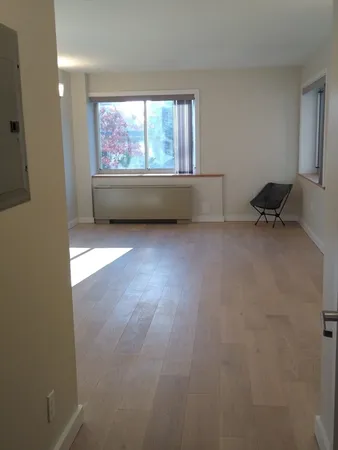 an empty room with a window