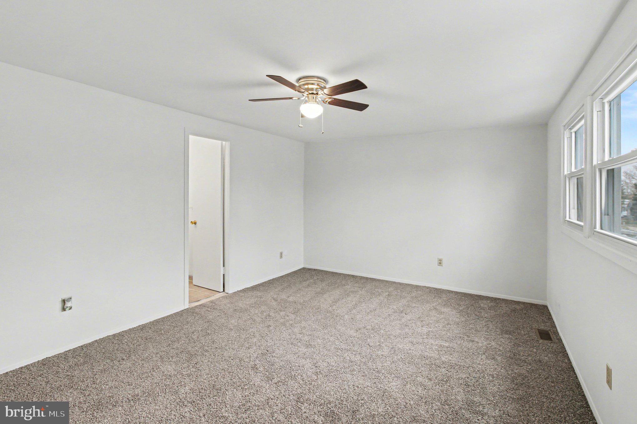 70 Rittenhouse Drive Willingboro, NJ 08046 - Photo 18 of 25 a view of an empty room with a window