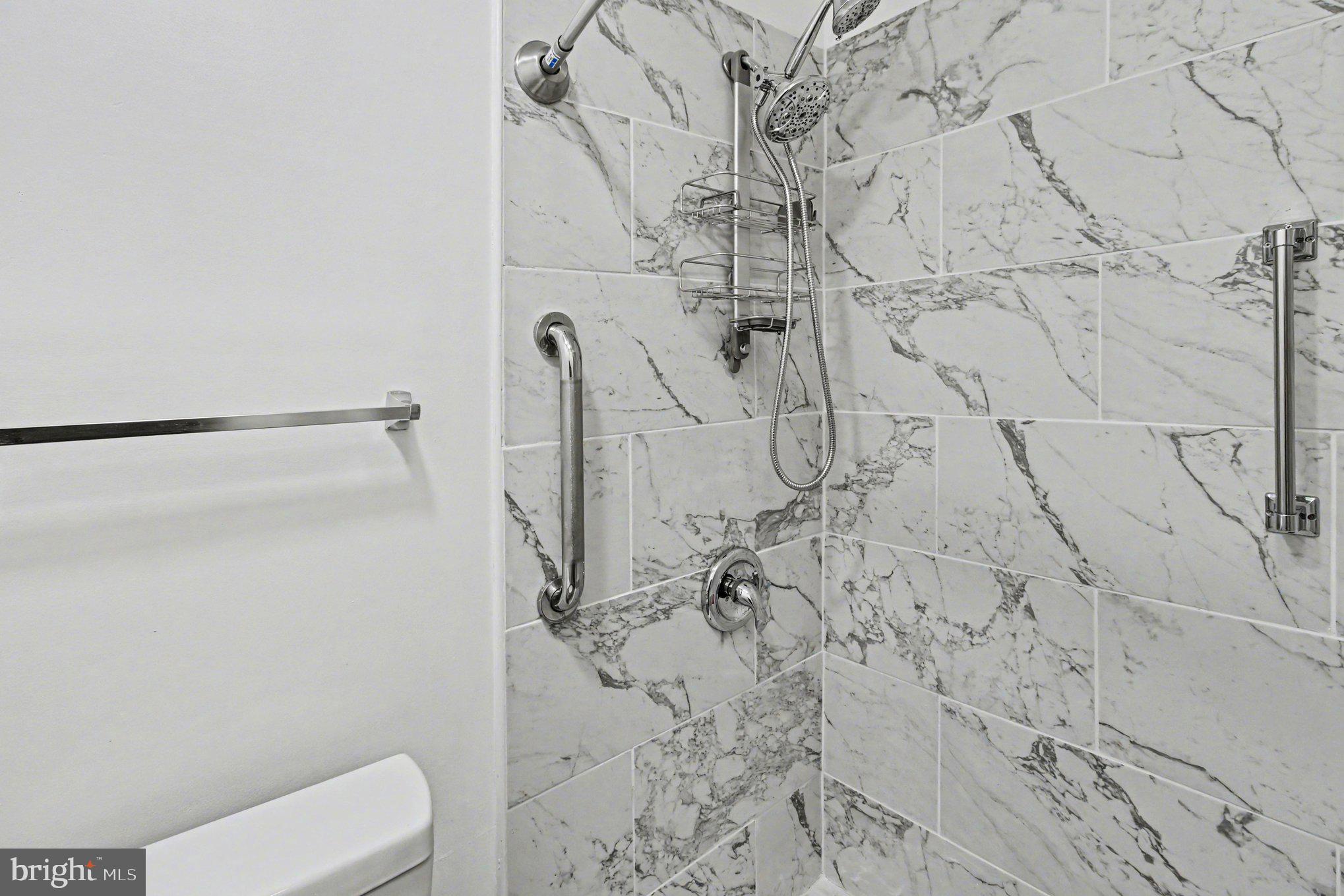 70 Rittenhouse Drive Willingboro, NJ 08046 - Photo 21 of 25 a bathroom with a toilet and a shower