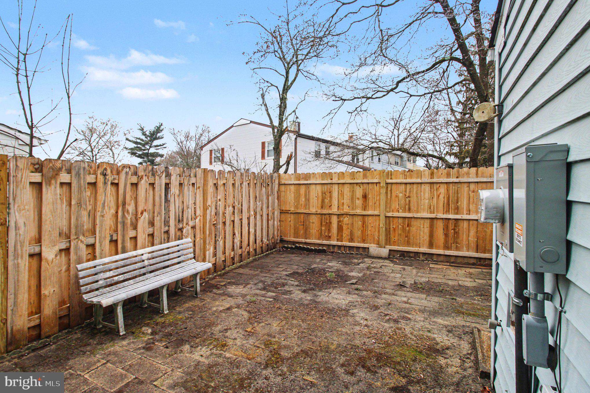 70 Rittenhouse Drive Willingboro, NJ 08046 - Photo 23 of 25 a view of a backyard with wooden fence