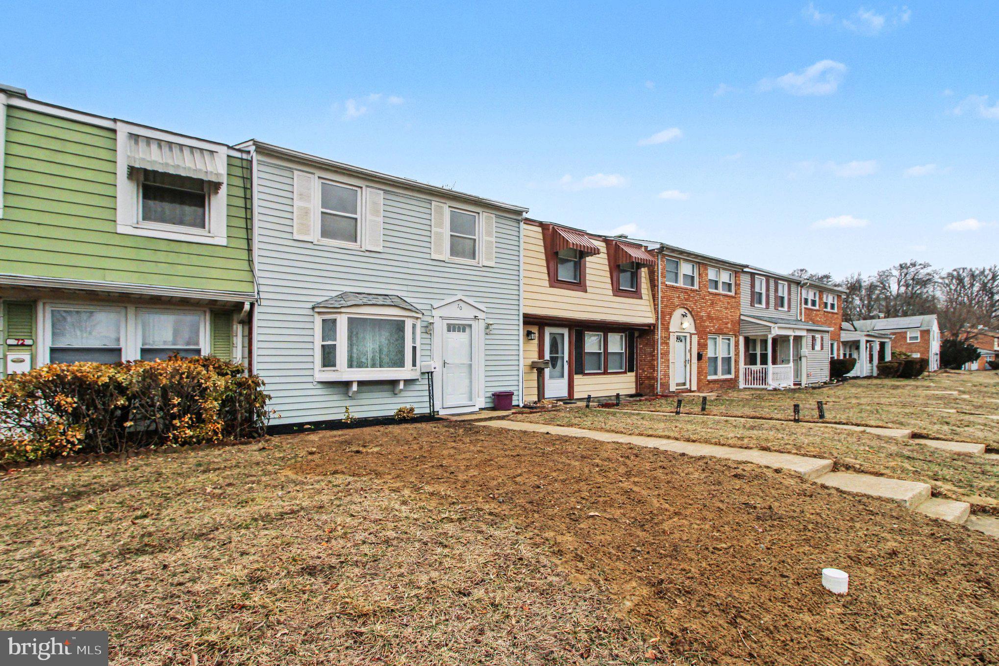 70 Rittenhouse Drive Willingboro, NJ 08046 - Photo 4 of 25 a front view of a building with a garden