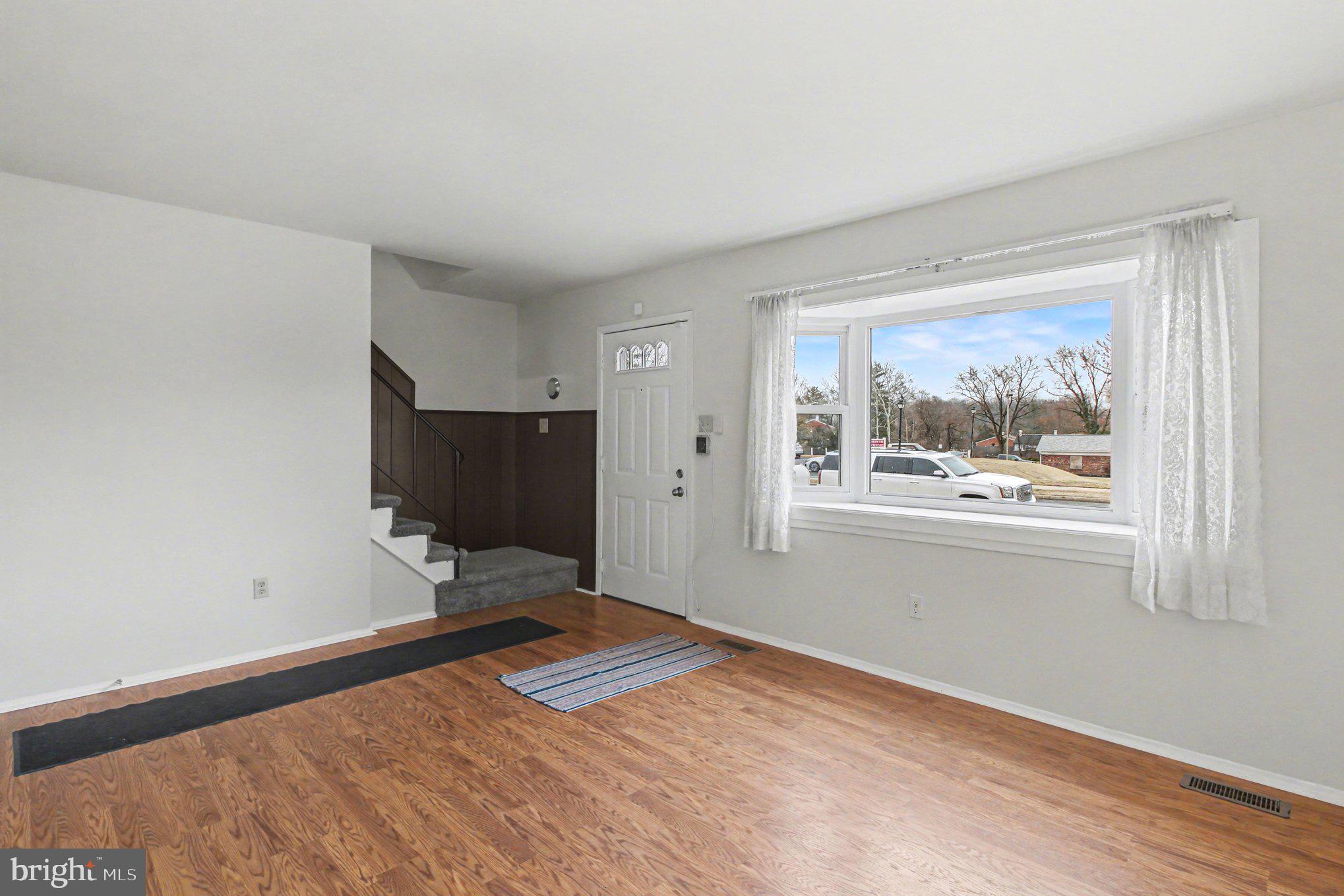 70 Rittenhouse Drive Willingboro, NJ 08046 - Photo 6 of 25 a view of a room with wooden floor and cabinet