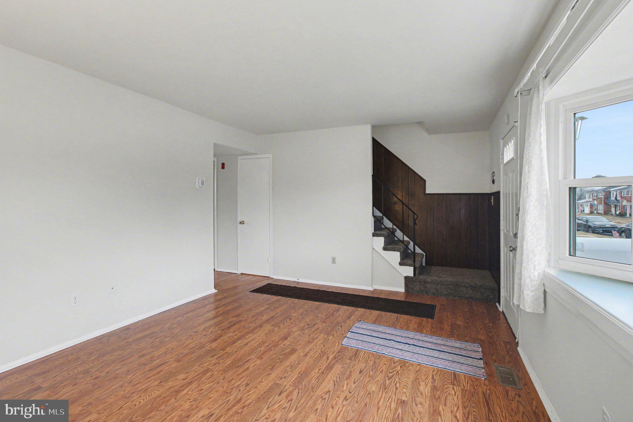 70 Rittenhouse Drive Willingboro, NJ 08046 - Photo 7 of 25 a view of empty room with wooden floor and fan