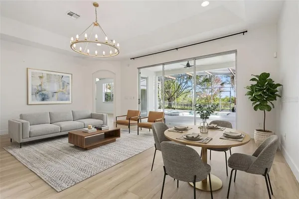 a bedroom with a bed and a table in it