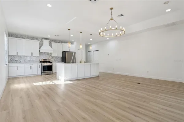 a bathroom with a sink double vanity and a mirror