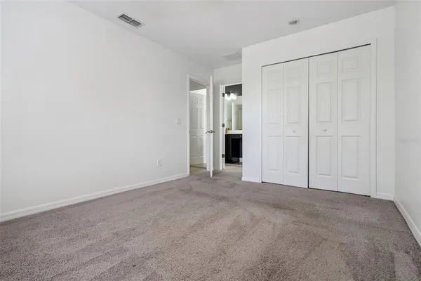 a bath tub sitting next to a shower