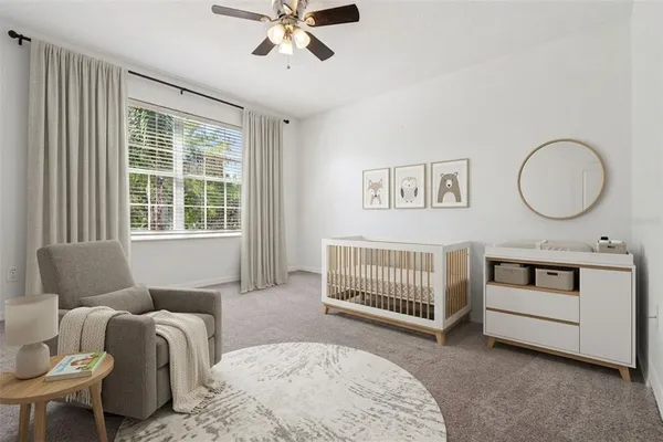 a view of a backyard with a swimming pool