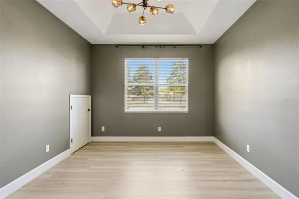 an aerial view of a house with a garden
