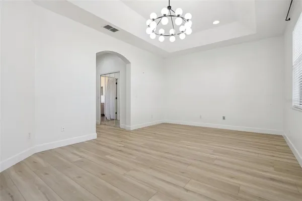 an aerial view of a city with lake view