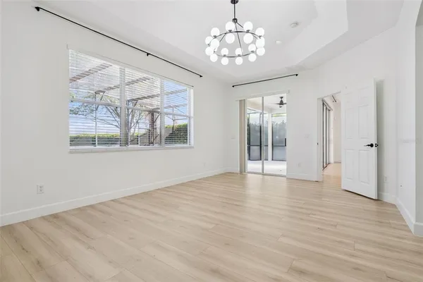 an aerial view of residential house with outdoor space and lake view