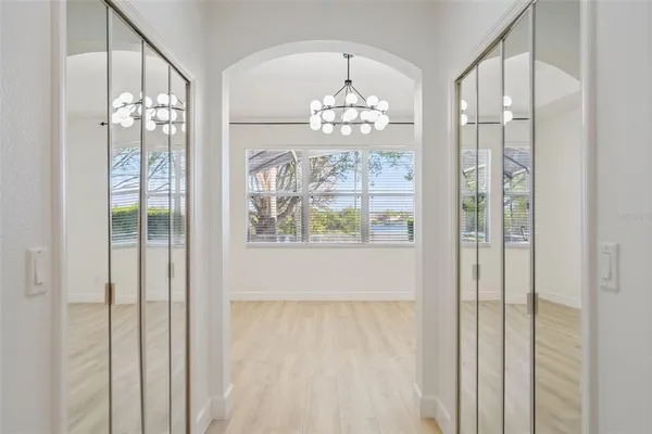 a view of a garden with a building in the background