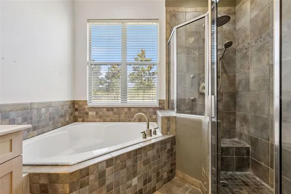 an aerial view of a house with a garden