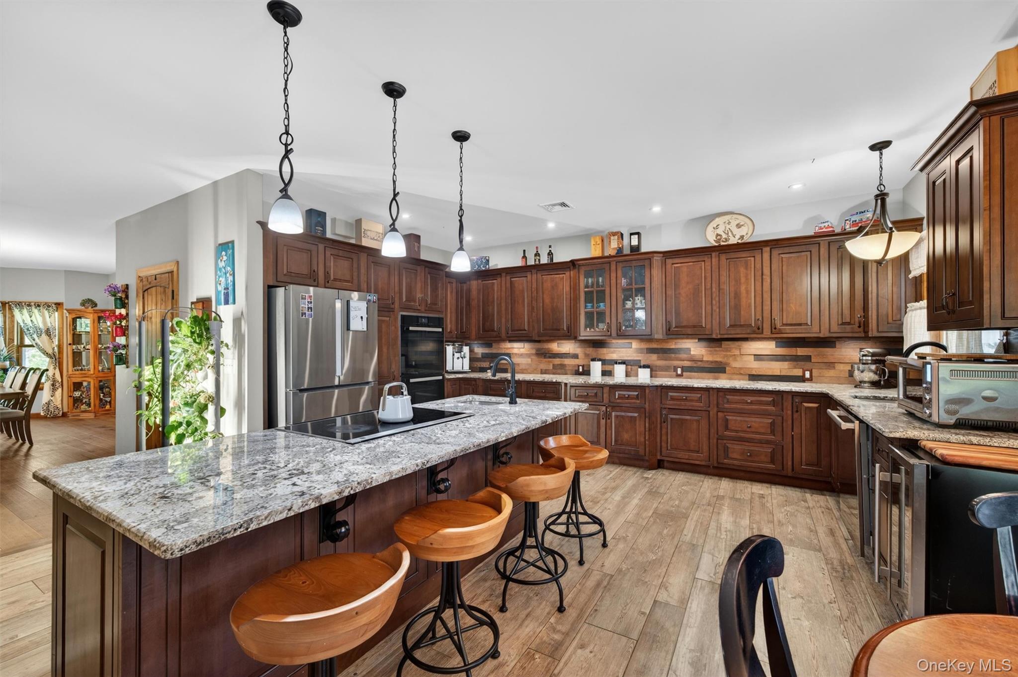 2 White Horse Road Middletown, NY 10940 - Photo 14 of 47 Thoughtfully crafted for those who love to cook, bake, and gather, the kitchen offers a warm and inspiring space for everyday culinary adventures.