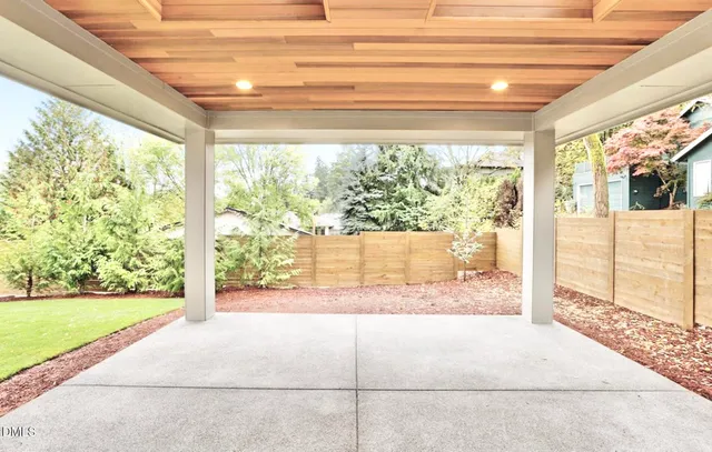 a front view of a house with a patio