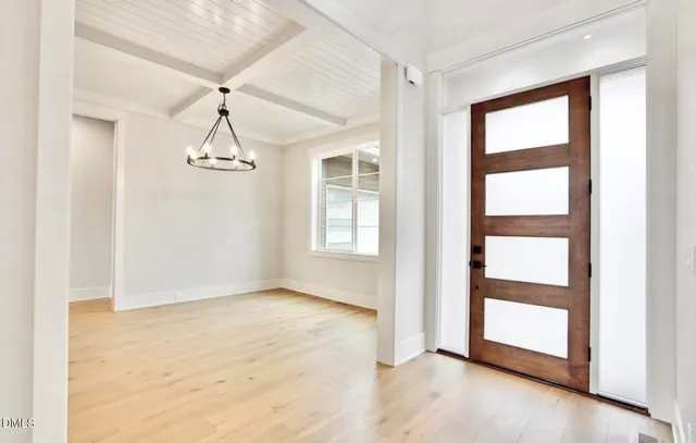 a view of empty room with windows