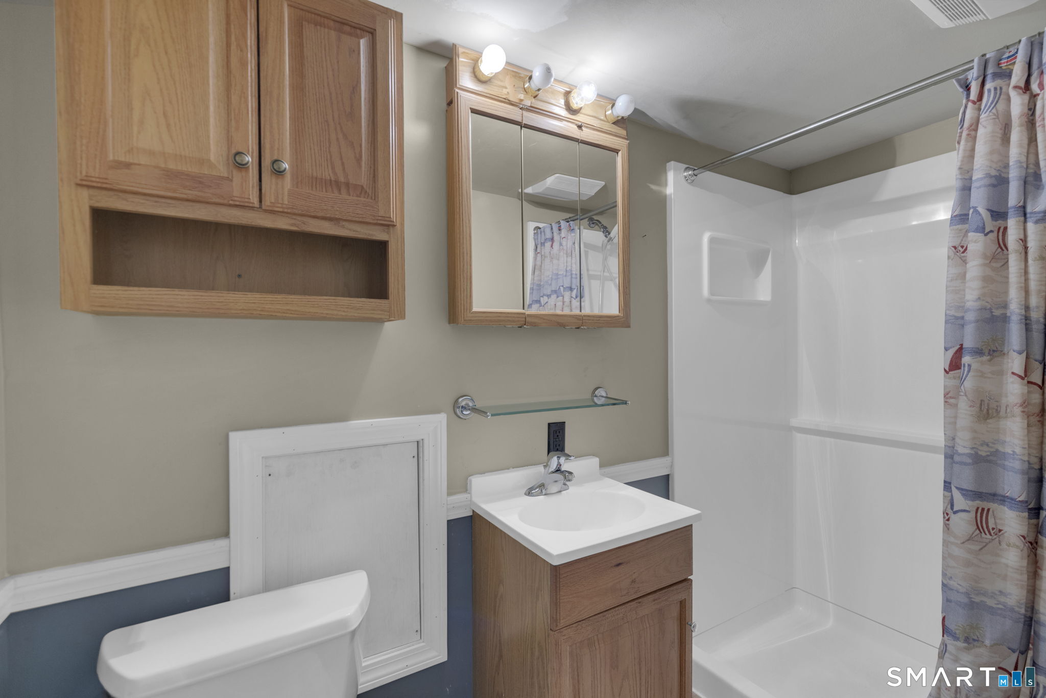 102 Wayne Lane Meriden, CT 06450 - Photo 24 of 36 a bathroom with a toilet sink and mirror