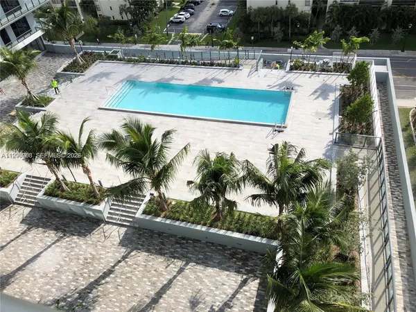 a kitchen with a stove and a refrigerator