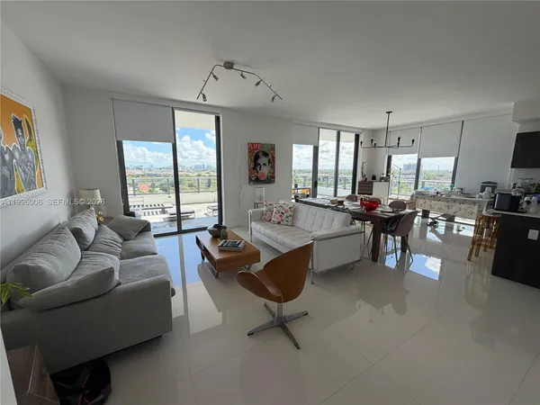 a building view with swimming pool and glass windows