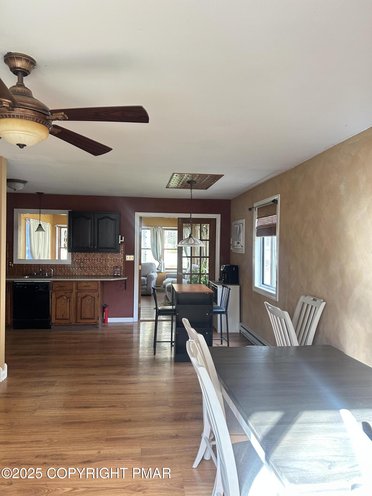 1152 Steele Circle Bushkill, PA 18324 - Photo 15 of 39 a living room with furniture and wooden floor