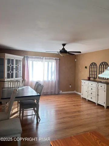 a workspace with furniture and window