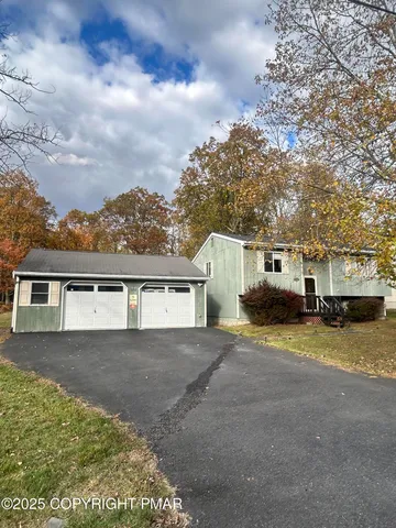 front view of a house with a street