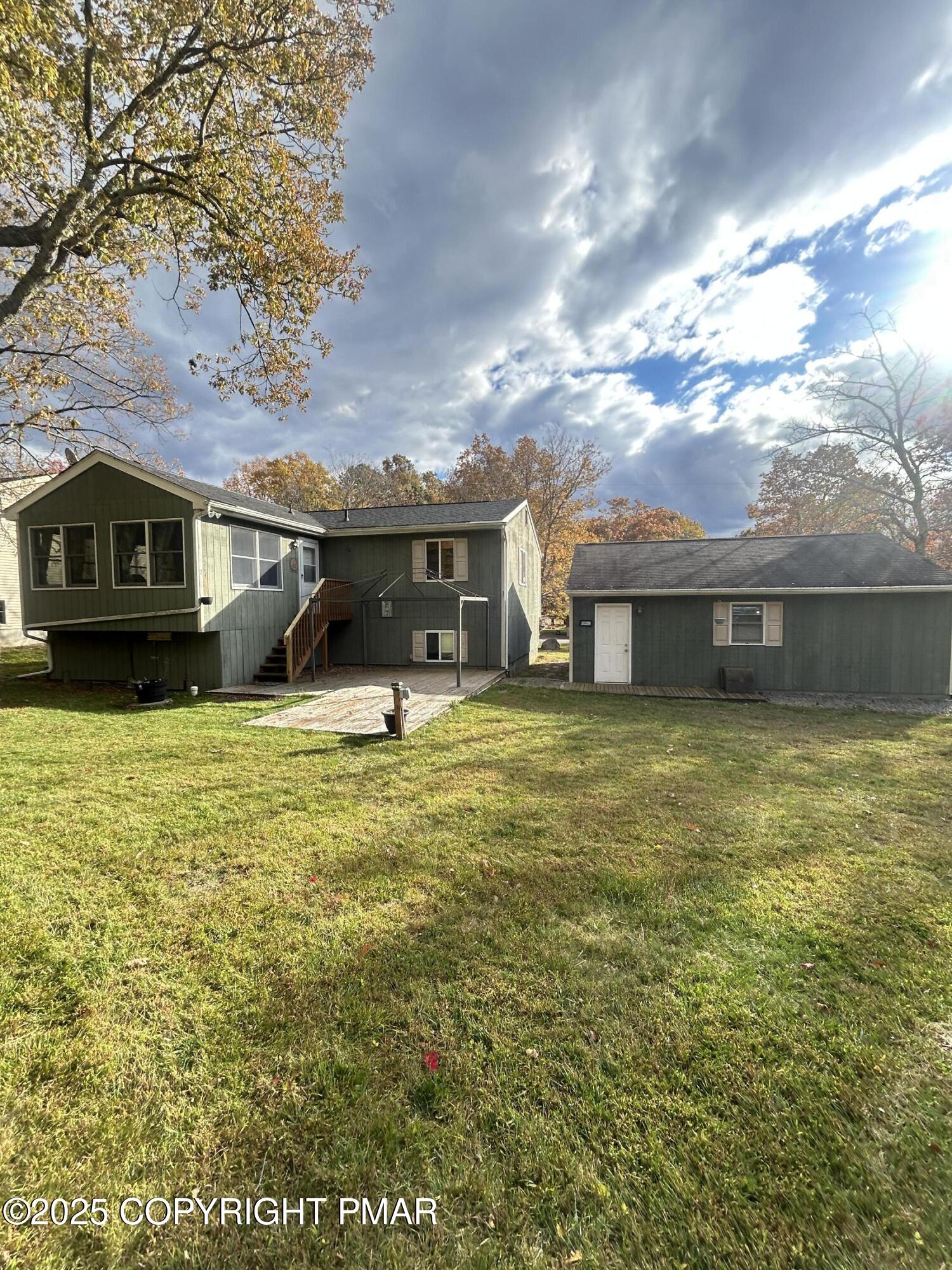 1152 Steele Circle Bushkill, PA 18324 - Photo 29 of 39 a front view of a house with a yard