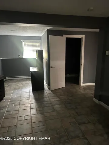 a view of entryway with a hallway