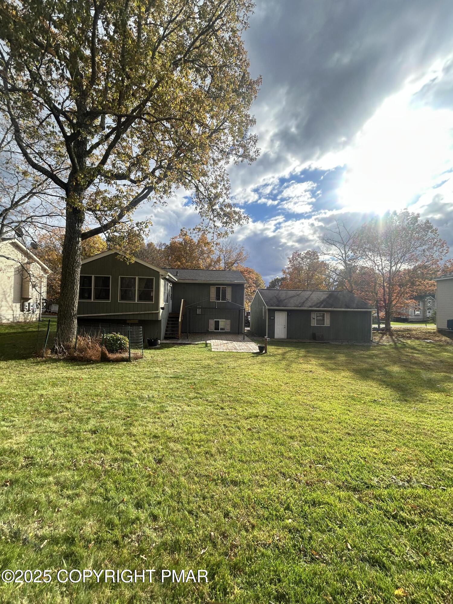 1152 Steele Circle Bushkill, PA 18324 - Photo 35 of 39 a front view of a house with a garden