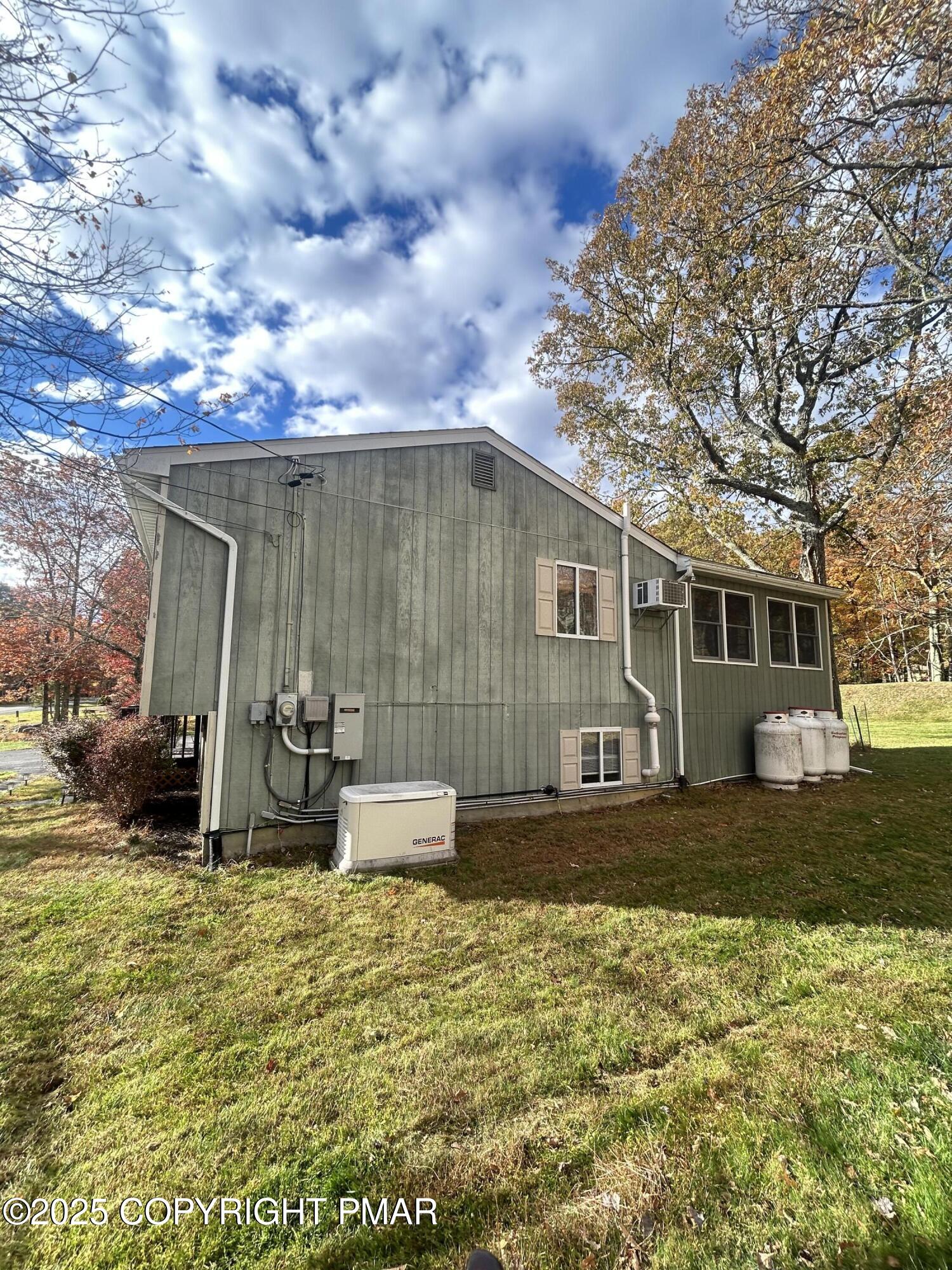 1152 Steele Circle Bushkill, PA 18324 - Photo 37 of 39 a view of a house with backyard and sitting area