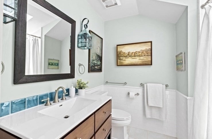 30 Lighthouse Road, Unit 30 Scituate, MA 02066 - Photo 11 of 18 a bathroom with a sink mirror vanity and toilet