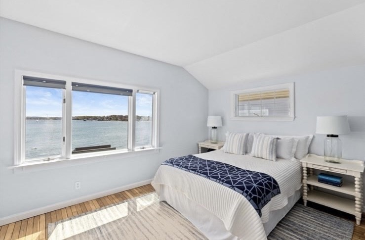 30 Lighthouse Road, Unit 30 Scituate, MA 02066 - Photo 8 of 18 a bedroom with a large bed and a large window