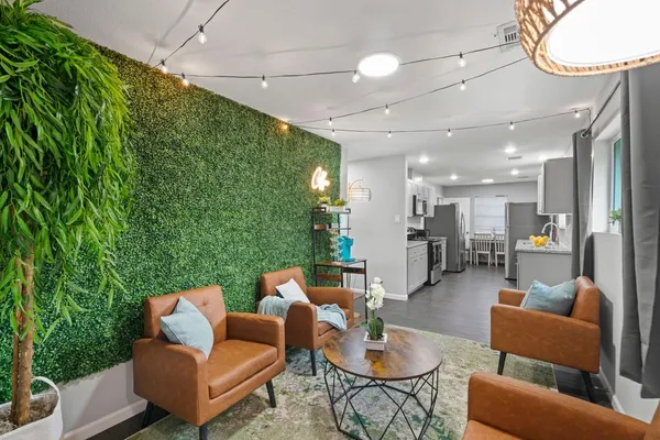 a outdoor living space with furniture and a potted plant