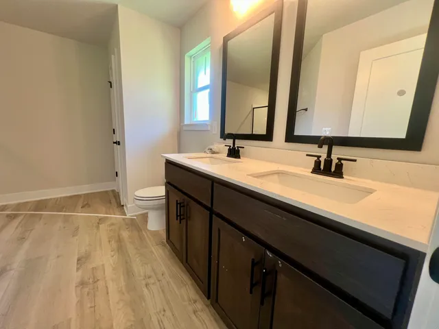 a bathroom with a glass shower door