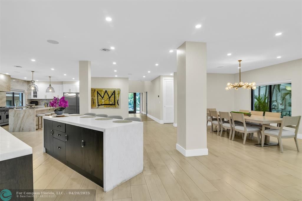 319 South Riverside Drive Pompano Beach, FL 33062 - Photo 28 of 98 a view of kitchen with kitchen island stainless steel appliances a sink and stove