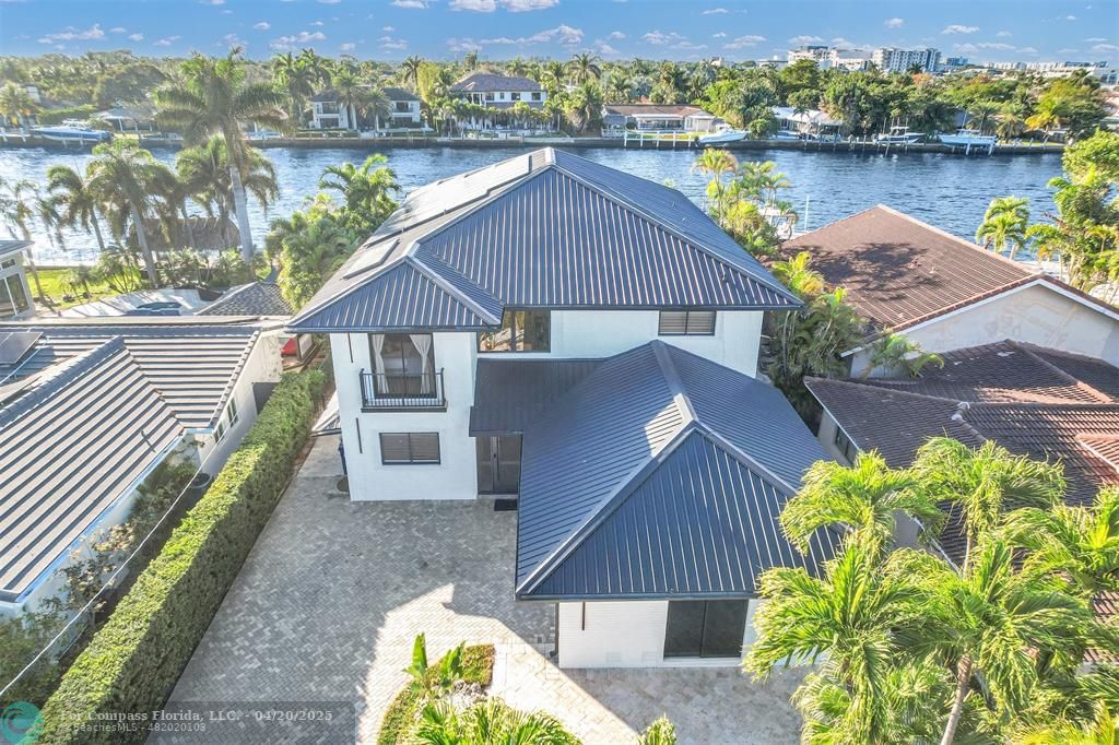 319 South Riverside Drive Pompano Beach, FL 33062 - Photo 3 of 98 a view of a house with a lake view