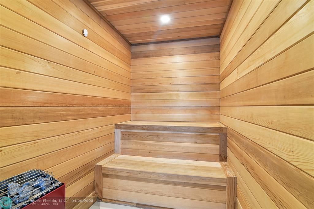 319 South Riverside Drive Pompano Beach, FL 33062 - Photo 47 of 98 a bathroom with a shower and a sink