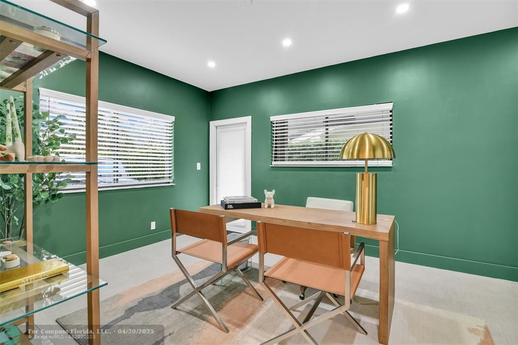 319 South Riverside Drive Pompano Beach, FL 33062 - Photo 56 of 98 a room with furniture and a window