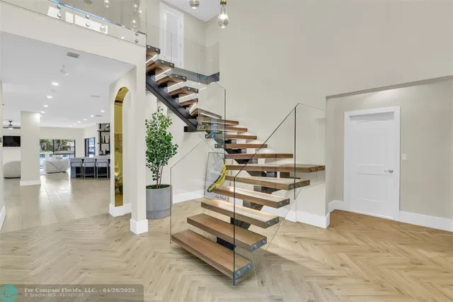a kitchen with a dining table and chairs
