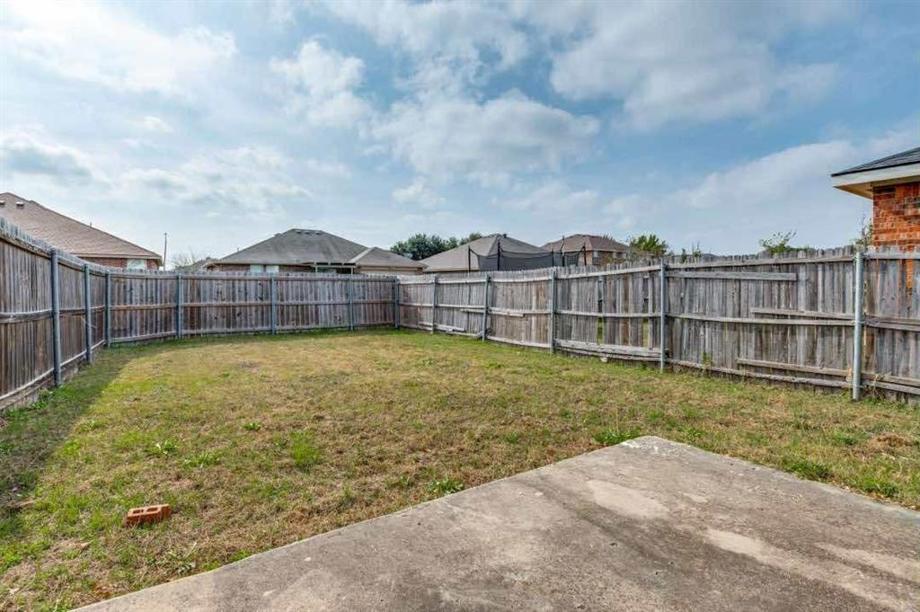 2118 Augusta Street Lancaster, TX 75146 - Photo 24 of 25 a view of a swimming pool with a garden
