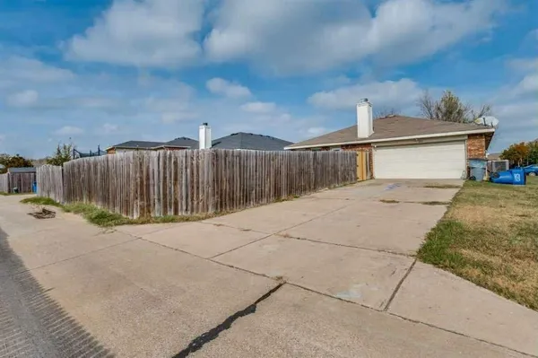 a view of backyard of house